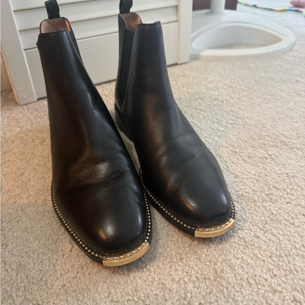 Coach Black Leather Ankle Boots with Gold Accents